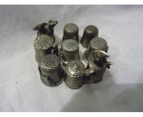 Collection of nine castle themed pewter thimbles. UK P&amp;P Group 1 (£16+VAT for the first lot and £2+VAT for subsequent lot