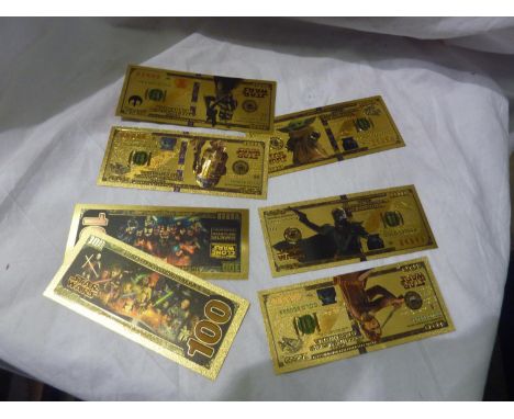 Seven gold plated novelty notes of Star Wars Jedi. UK P&amp;P Group 0 (£6+VAT for the first lot and £1+VAT for subsequent lot