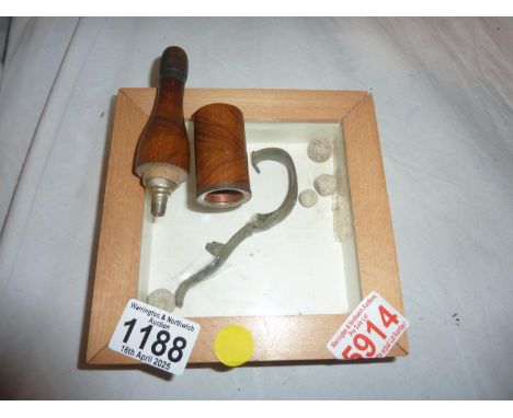 Framed Flintlock pistol trigger and musket balls and a vintage pipe. Not available for in-house P&amp;P 