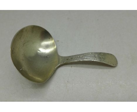 A George III silver caddy spoon, a/f