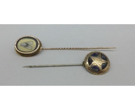 Two yellow metal stick pins, one set with mosaic insect and one set with hardstone