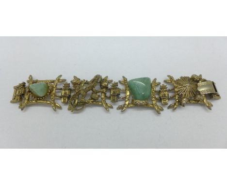 A gilt bracelet set with jade