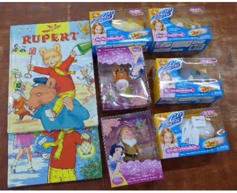Two Rupert annuals and four Go Go Pets, boxed and two Mattel Disney figures