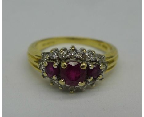 An 18ct gold, ruby and diamond ring, 4.2g, L