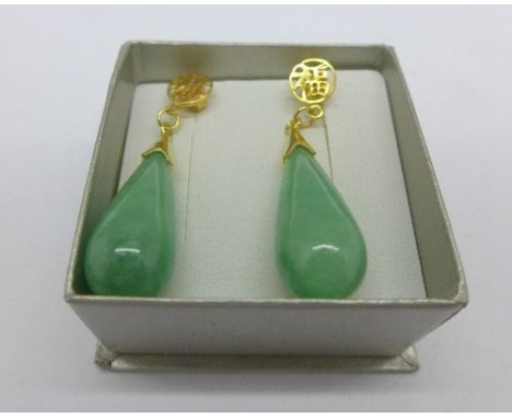 A pair of silver gilt and jade drop earrings