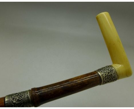 A bamboo swordstick with silver mount and ivory handle, the mount hallmarked Chester 1896