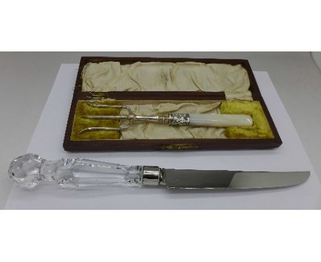 A bread fork with mother of pearl handle and silver collar, Sheffield 1908, cased and a bread knife with crystal handle, boxe