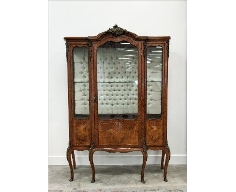 VITRINE, Louis XV style tulipwood, burr elm and gilt metal mounted with glazed door enclosing a glass shelf and buttoned fabr