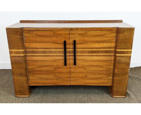SIDEBOARD, Art deco walnut with horizontal inlay and two doors enclosing a drawer and shelves, 87cm H x 138cm x 50cm. 