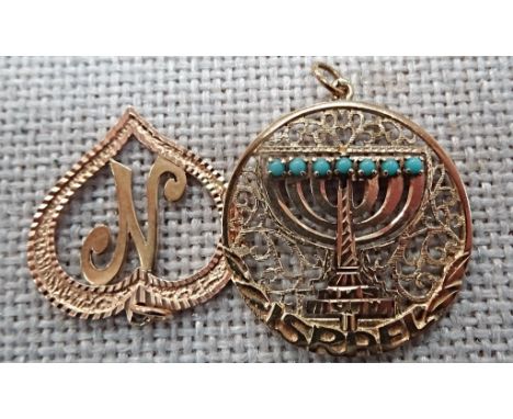 Two gold pendants to inc an 'N' in heart, & a Judaica turquoise & ruby set pendant