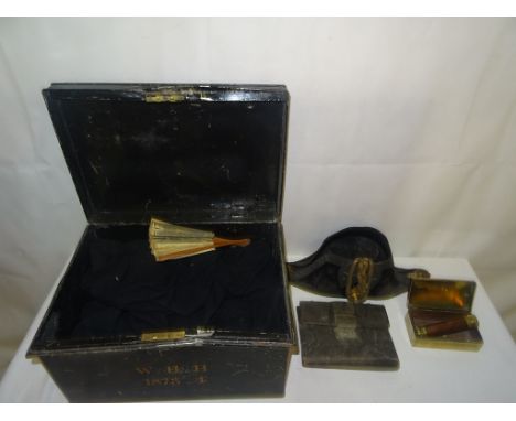 A Victorian serviceman's trunk (1873-4) with Gillot & Masel naval hat, writing folder, telescope and cape