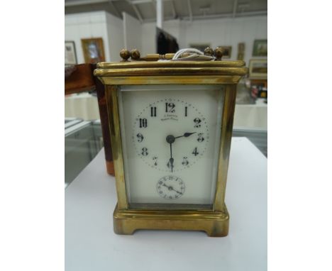 A 19th century carriage clock in carrying case