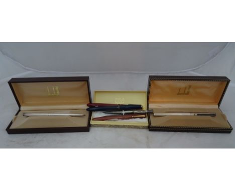 A boxed Dunhill fountain pen and pencil with an engine-turned decoration; together with two 'Javdo' led pencils and three fou