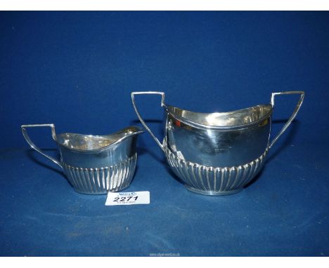 A Silver cream jug and matching two handled sugar basin, Birmingham 1901, maker IL, 162 gms total.