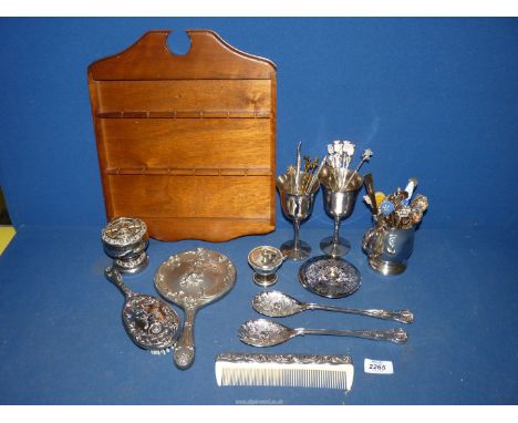 A small quantity of Epns including souvenir spoons with rack, goblets, dressing table mirror, comb and brush, rose bowl, etc.