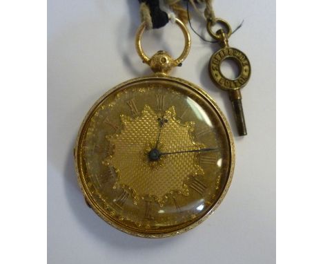 An 18ct gold cased pocket watch, having floral and foliate bright-cut engraved decoration, faced by an engine turned and text