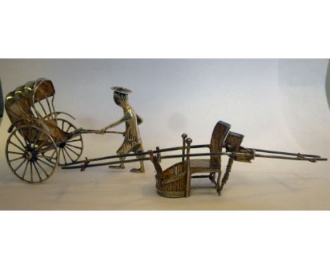 A 20thC Chinese silver coloured metal miniature model, a palanquin; and a rickshaw with a standing figure 