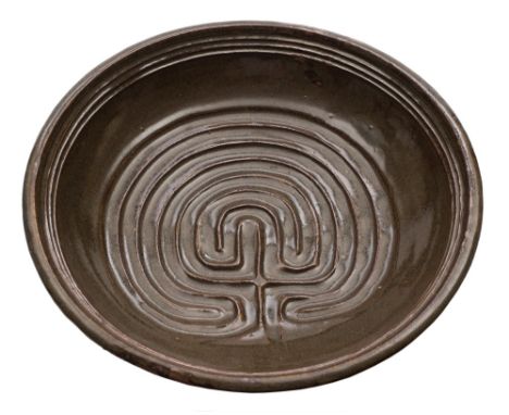 * Michael Cardew [1901-1983] a stoneware bowl: of shallow circular form the interior with finger incised palmette decoration 