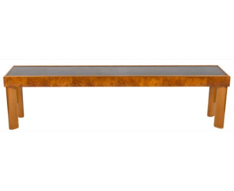 A Swedish burr elm veneered birch and black simulated leather bench seat:, the burr elm veneered apron sides on birch oval sh