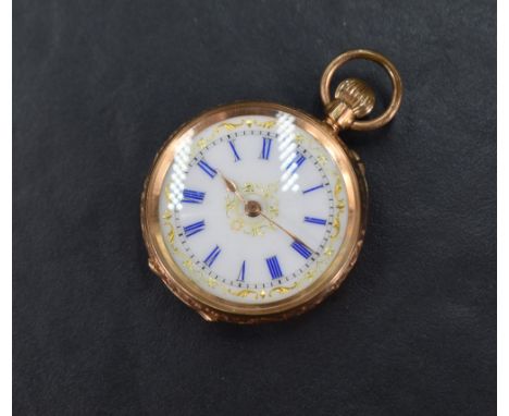 A small continental gold top wound pocket watch stamped 14K having blue Roman numeral dial with gilt decoration on a white en