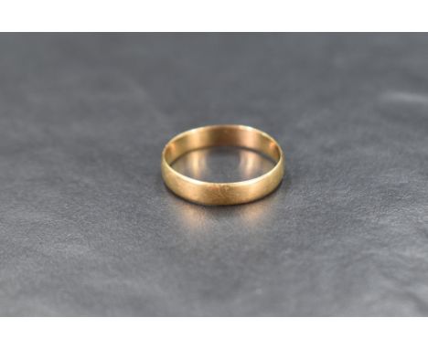 An 18ct gold wedding band, ring size R-S, 2.5g