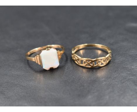 Two 9ct gold rings, one being of pierced band form, the other having a faux opal panel, size P/Q &amp; approx 3g total