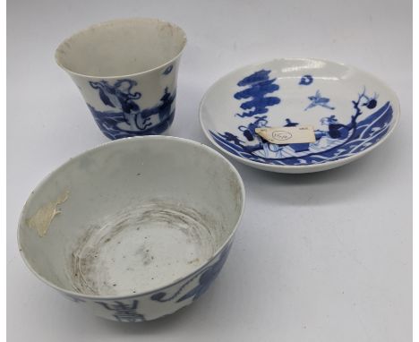 A 19th century Chinese blue and white porcelain teacup, D.8cm, bowl, D.10cm, and saucer, D.12.5cm, character and wax seal mar