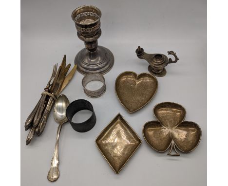 A collection of silver items to include a Reed &amp; Barton candlestick, diamond heart and clubs dishes, Egyptian oil lamp, 2