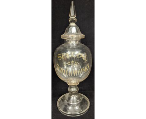 19th glass Special Scotch Whiskey dispenser H. 61, with a collection of painted Easter eggs