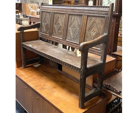 CARVED OAK BENCH
