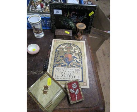 A Victorian blotter, decorated with flowers, together with a machline egg timer printed with a view of Clacton on Sea, a carv