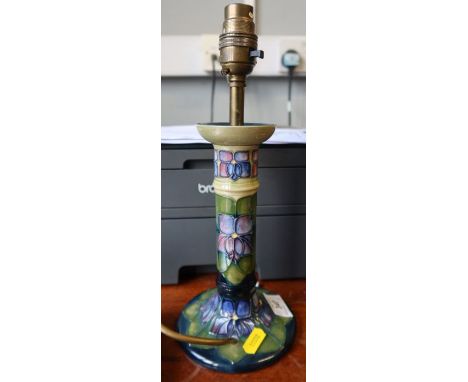A Moorcroft Pottery candlestick lamp base, decorated in the Violet pattern, height 12ins