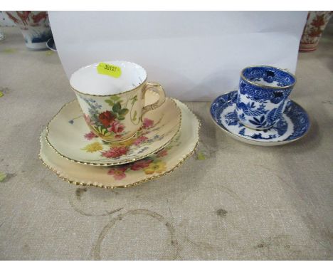 A Royal Worcester blush ivory trio, the cup, saucer and plate decorated with flowers, together with a Royal Worcester coffee 