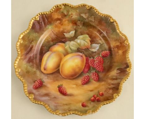 A Royal Worcester cabinet plate, decorated with fruit to a mossy background by H H Price, with shaped gilt edge, diameter 9in
