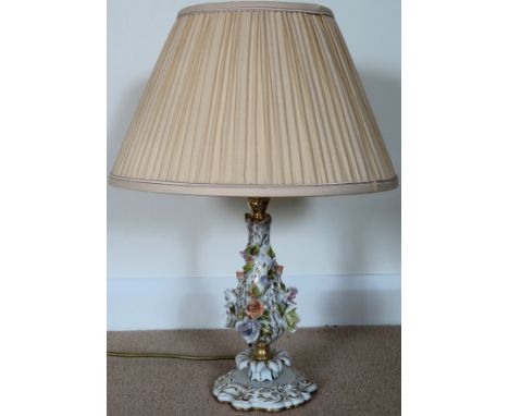 Contintal style relief floral decorated ceramic table lamp with shade. Approx. 51cms H

used with minor chips to petals etc. 