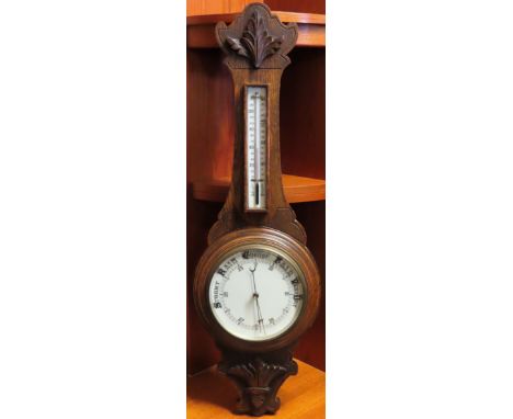Oak cased wall hanging barometer. Approx. 90cm H

Reasonable used condition, not tested for working 