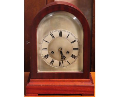 Early 20th century mahogany cased mantle clock with brass dial. Approx. 36cm H

Used condition, not tested for working 