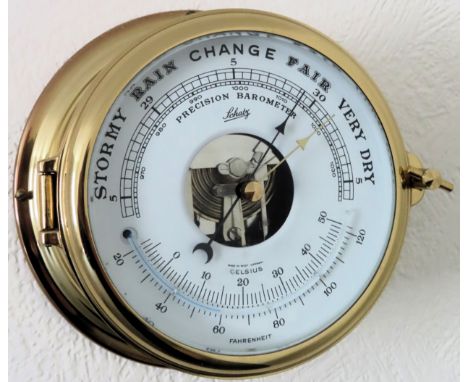 Schatz 20th century brass wall mounting circular barometer. Approx. 18cms D

reasonable used condition not tested 