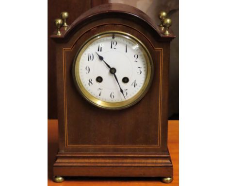 Inlaid mahogany mantle clock with circular enamelled dial. Approx. 36cm H

Used condition, not tested for working 