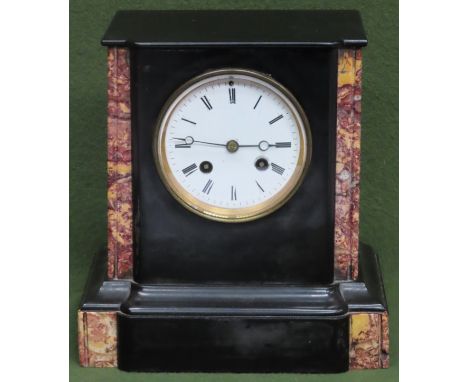 Vintage black slate mantle clock with enamelled circular dial. Approx. 23cm

Used condition, not tested for working 