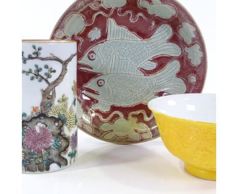 A Chinese white glaze porcelain brush pot with painted enamel decoration, height 12cm, and 2 Chinese porcelain bowls (3) 