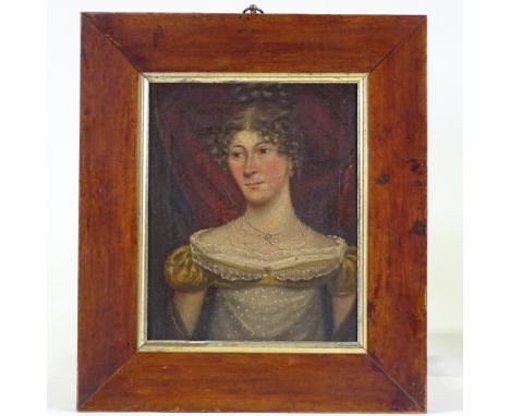 Early 19th century English School, oil on canvas, half length portrait of a young woman, unsigned, 9" x 7.5", maple-framed 