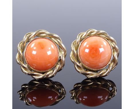 A pair of 9ct gold cabochon coral earrings, with clip fittings and rope twist surround, earring diameter 21.3mm, 13.4g 