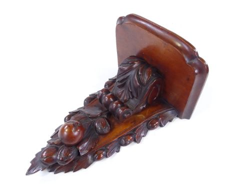 A Victorian mahogany wall bracket with carved 3-dimensional fruit and acanthus decoration, height 42cm, width 30cm 
