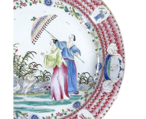 A Chinese famille rose porcelain charger, hand painted enamel ladies in gardens, diameter 39cm 