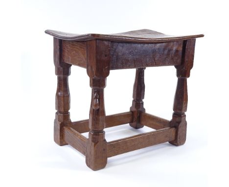 Robert Thompson (Mouseman), a burr-oak dish-topped joint stool, circa 1930, with bulbous octagonal supports and square stretc
