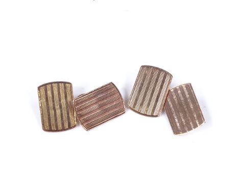 A pair of 9ct rose gold curved rectangular cufflinks, with engine turned decoration, hallmarks Birmingham 1926, panel length 