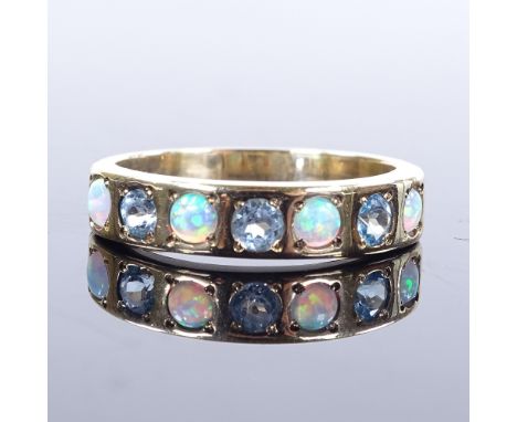 A 9ct gold 7-stone cabochon opal and blue topaz half-eternity ring, setting height 5.1mm, size T, 4.6g 