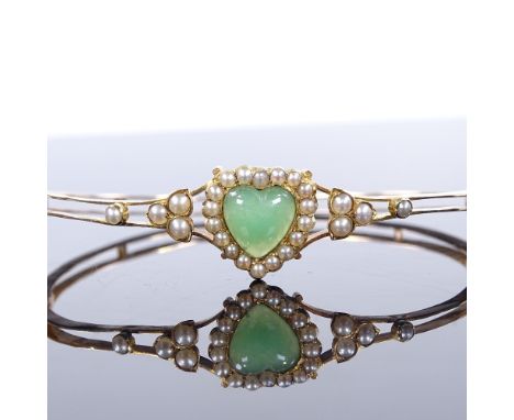 A Victorian 15ct gold green stone and pearl heart-shaped hinged bangle, with openwork body, internal diameter 58mm, internal 