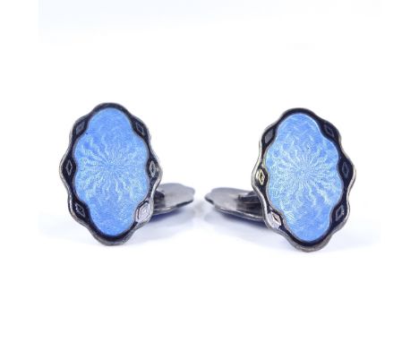 A pair of sterling silver and blue and black enamel double-sided cufflinks, with sunburst engine turned decoration, panel len